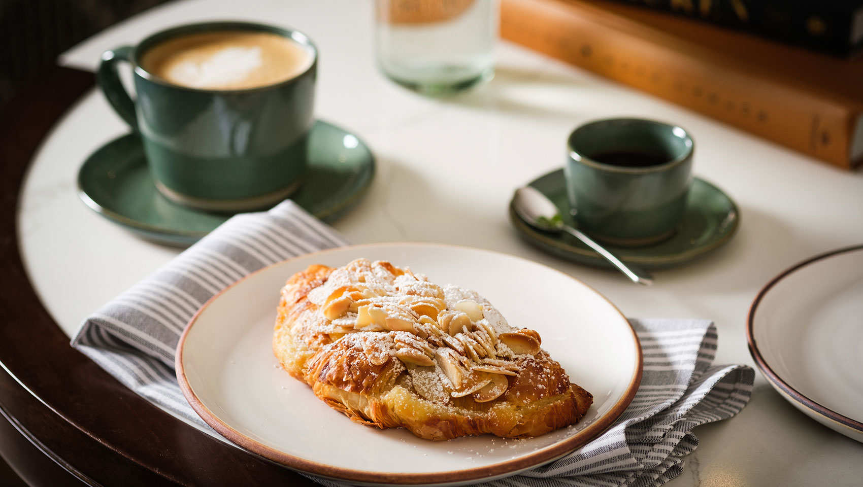 pastry and coffee on table